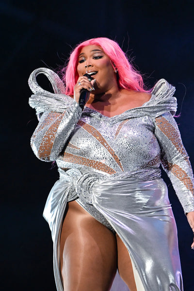 Lizzo Set the Stage on Fire with Her Music, Wearing an Amazing Silver Foil Dress
